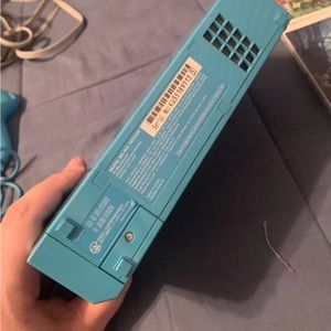 Wii. Comes with controllers, nunchuck and a game (Resident Evil)